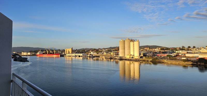 Eleven hours in a chair — The same view as the first photograph, now in gold light, the cement silos refle