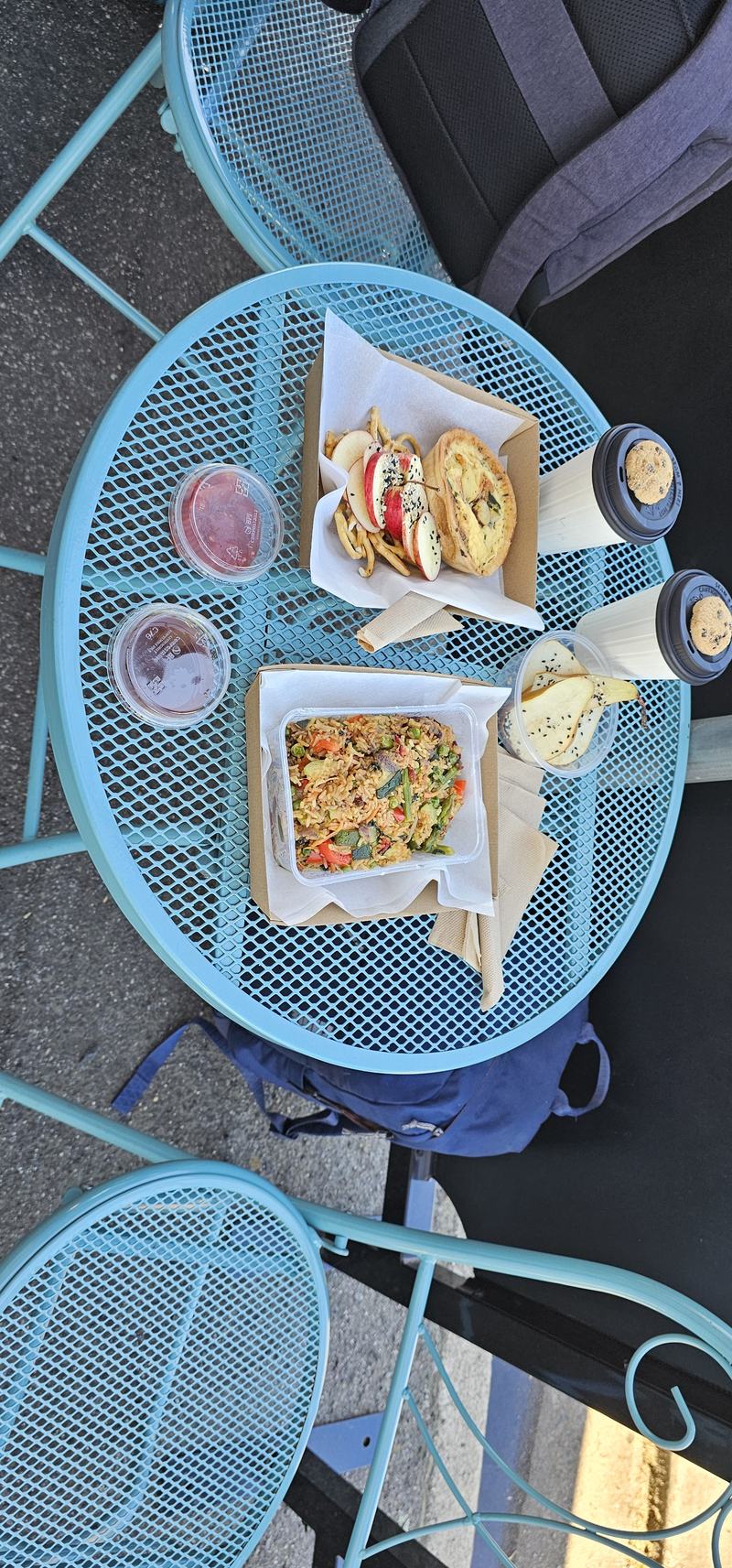 A gorge at the end of the street β Lunch at The Flying Sparrow: two boxes, fruit pots and two cups on a pale blue c