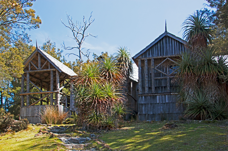 Weindorfer's mountain — Waldheim Chalet, a low timber building with a steep shingled roof among trees