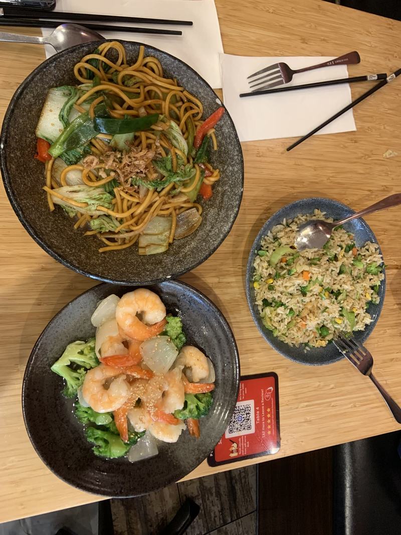 A mountain with four names — Three bowls on a wooden table: stir-fried noodles with bok choy and capsicum, ga